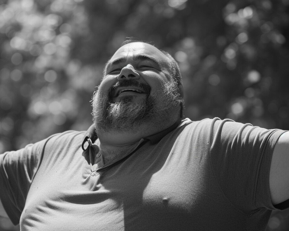 Happy, relieved man smiling with open arms, illustrating renewed confidence and comfort after discovering AppaNail.